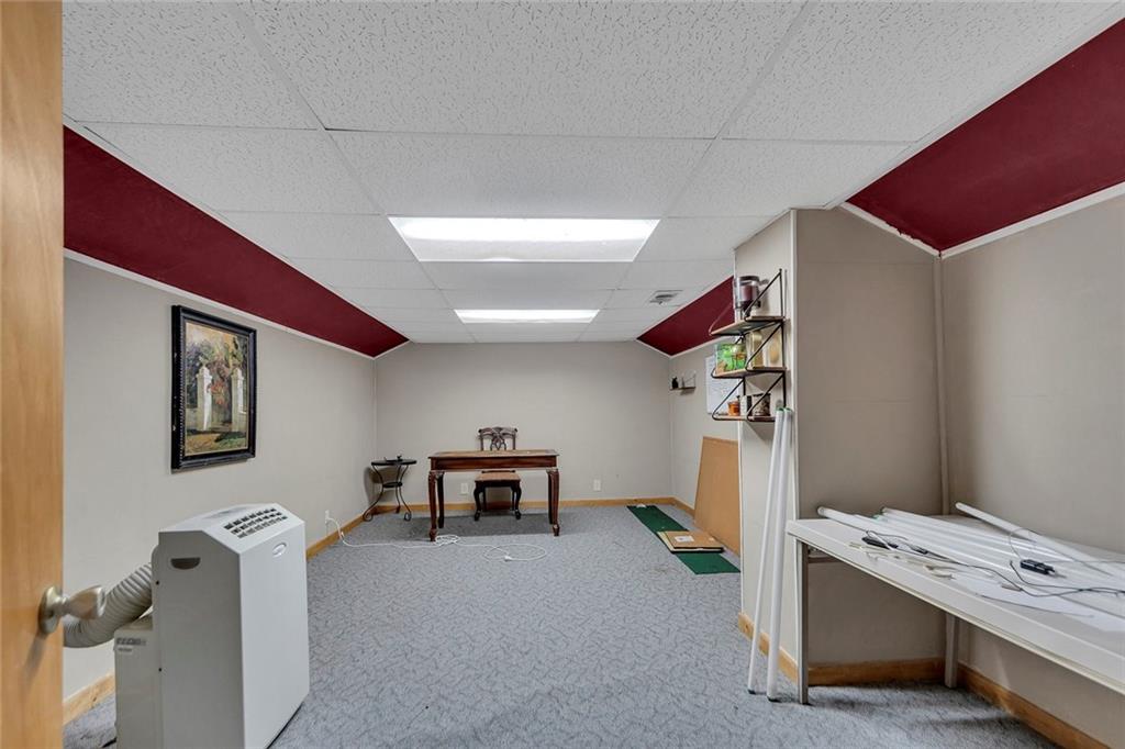 259 Holley Heights Jasper, GA 30143 - Photo 39 of 53 a room with furniture and a window