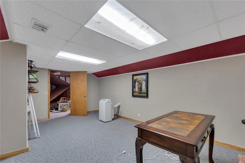 259 Holley Heights Jasper, GA 30143 - Photo 40 of 53 a room with furniture and white walls