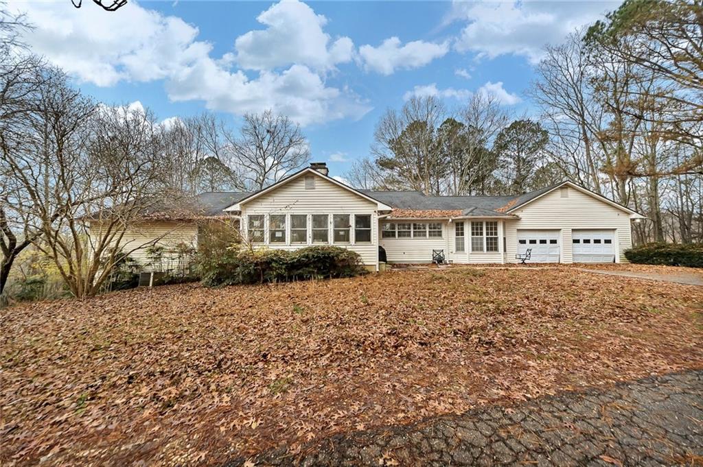 259 Holley Heights Jasper, GA 30143 - Photo 4 of 53 a front view of a house with a yard