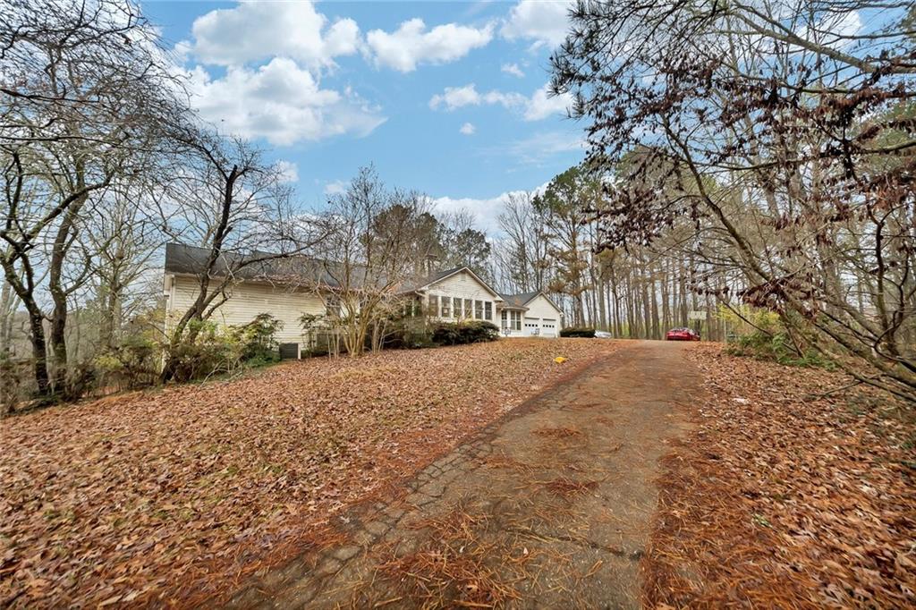 259 Holley Heights Jasper, GA 30143 - Photo 6 of 53 a view of road with snow on the roadside