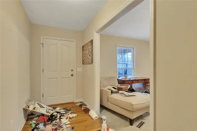 a bedroom with bed and a window