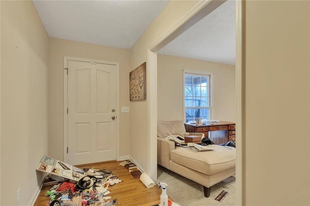 259 Holley Heights Jasper, GA 30143 - Photo 10 of 53 a bedroom with bed and a window