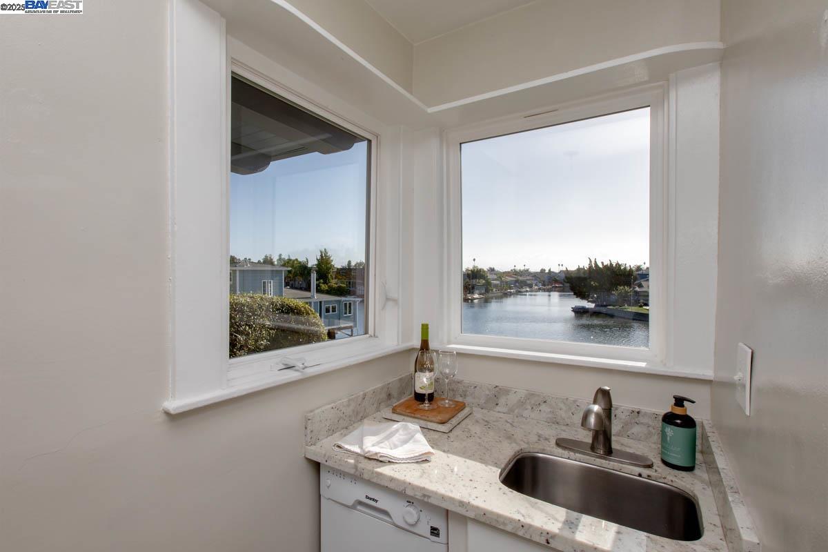 2000 Clinton Avenue Alameda, CA 94501 - Photo 18 of 57 a bathroom with a sink and a mirror