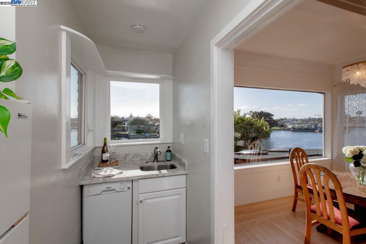 2000 Clinton Avenue Alameda, CA 94501 - Photo 19 of 57 a view of a dining room with furniture window and outside view