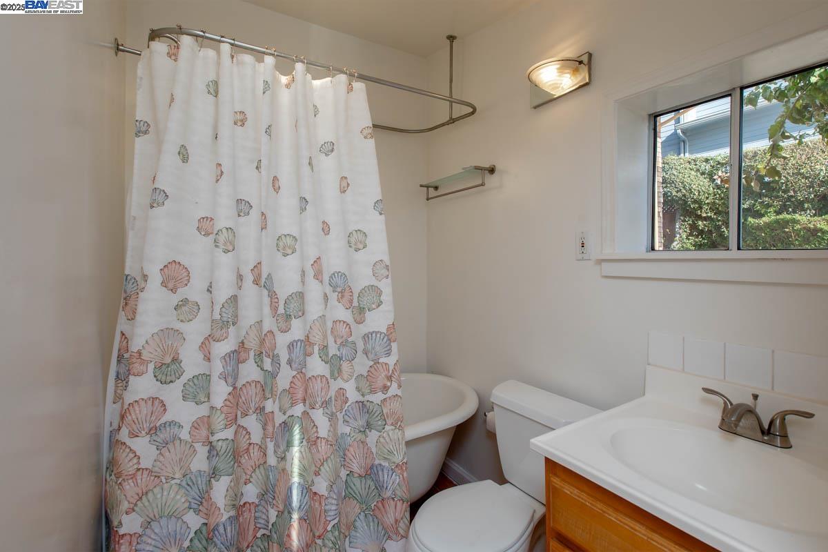 2000 Clinton Avenue Alameda, CA 94501 - Photo 48 of 57 a bathroom with a sink toilet and shower