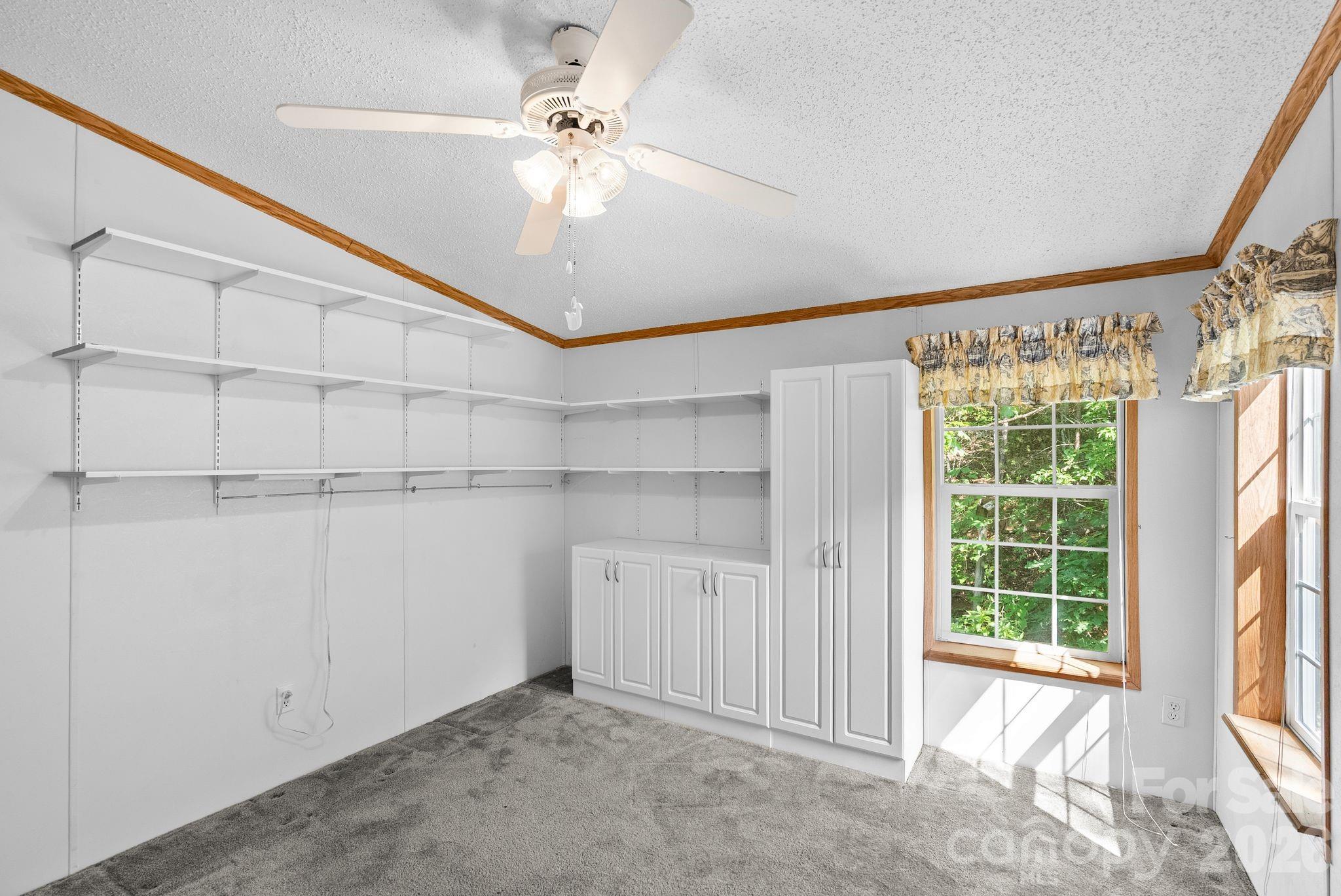 133 Spivey Mountain Road Asheville, NC 28806 - Photo 23 of 40 a view of an empty room with a window