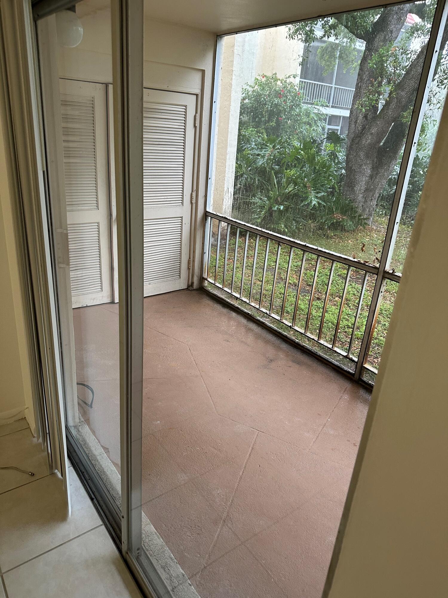 602 Northwest 13th Street, Unit 150 Boca Raton, FL 33486 - Photo 10 of 12 a view of a glass door