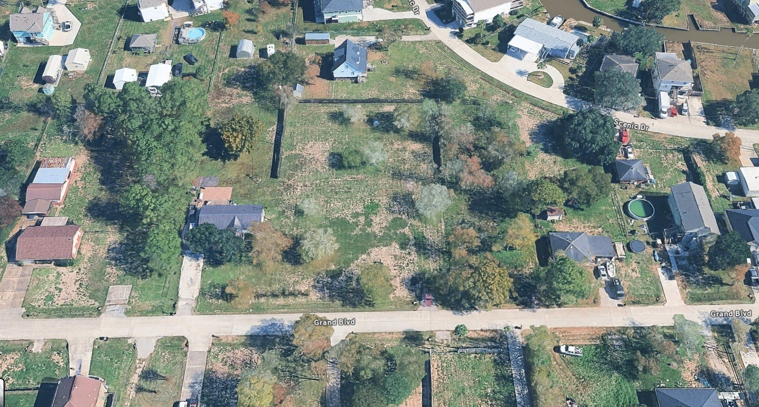 4131 Grand Boulevard Dickinson, TX 77539 - Photo 9 of 10 an aerial view of residential houses with outdoor space