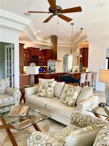 a view of a swimming pool with furniture