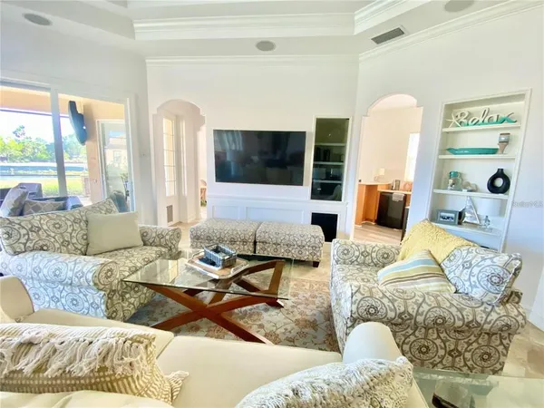 a living room with furniture and a rug