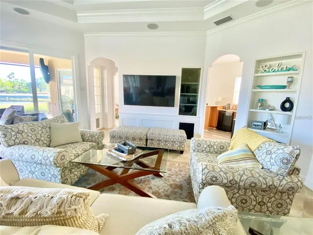 a living room with furniture and a rug