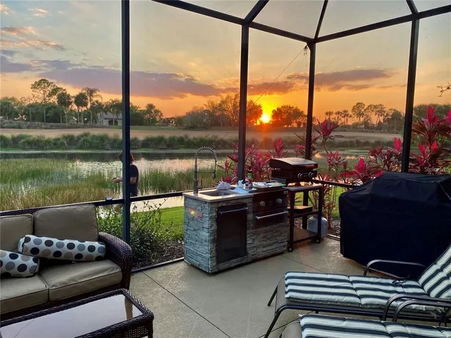 a view of a livingroom with furniture and windows