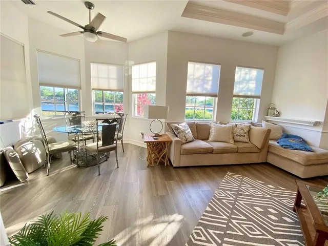 a bed room with a bed and a chair