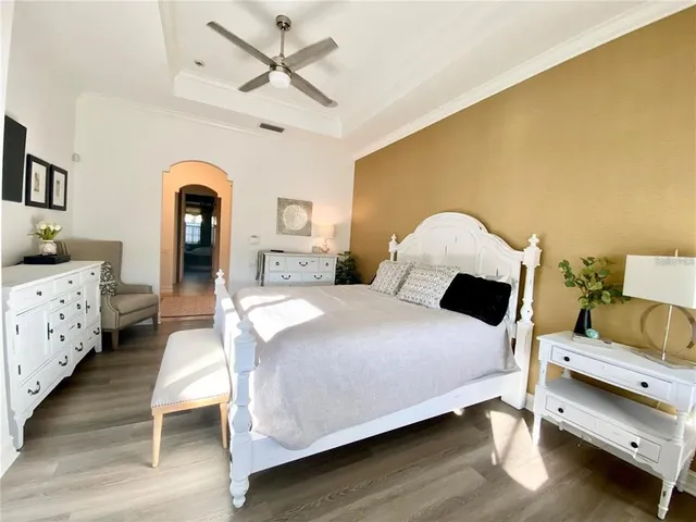 a bath tub sitting in a bathroom next to a window