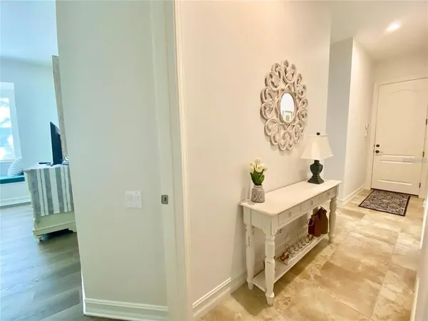 an aerial view of residential house with outdoor space and pool