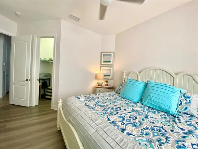 a view of field with grass and trees