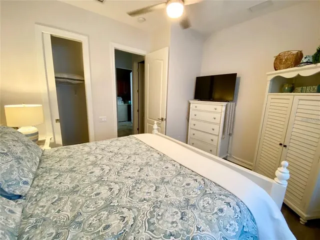 a view of a swimming pool with a table and chairs