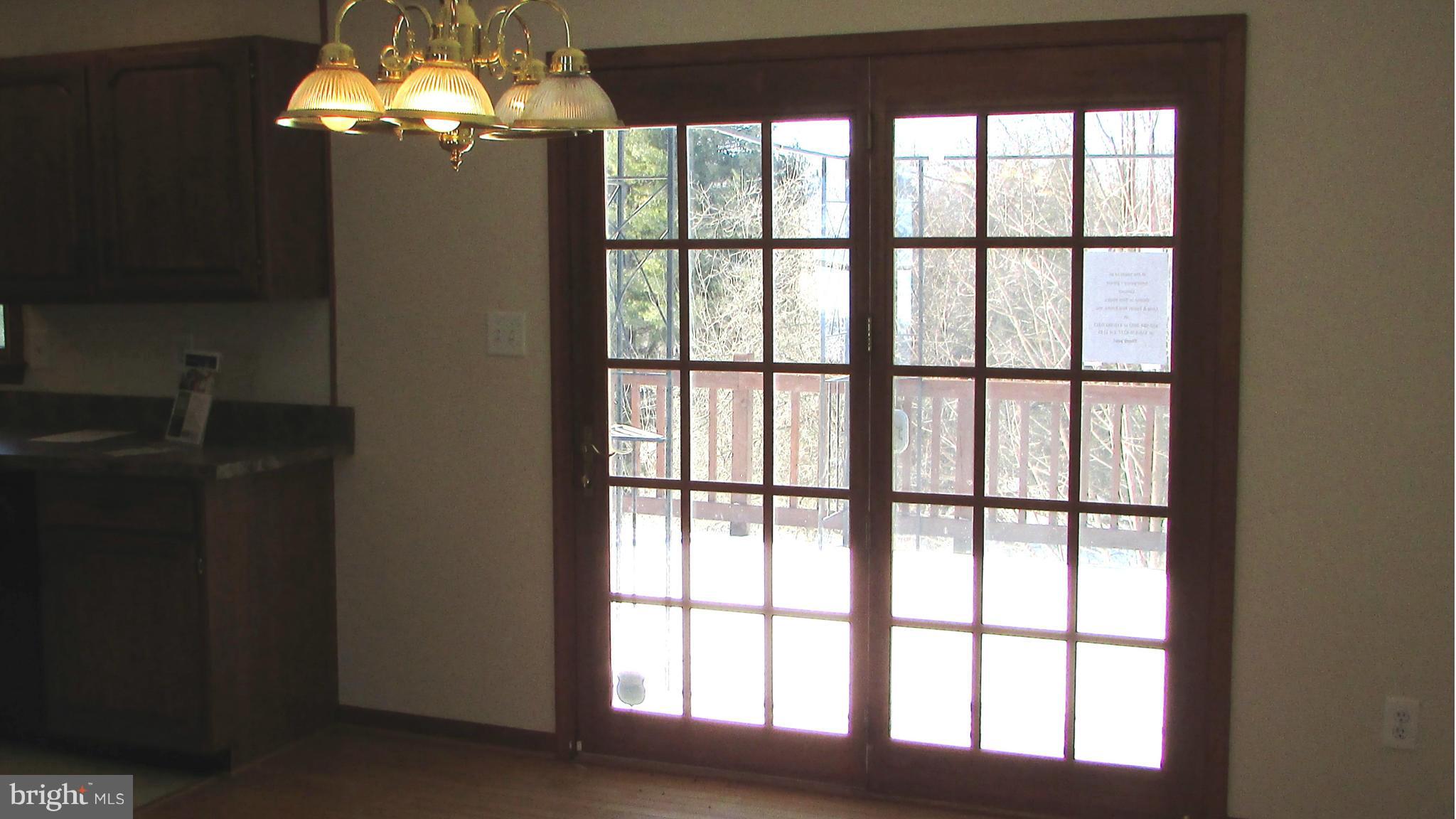 1534 Manchester Road Westminster, MD 21157 - Photo 7 of 18 Dining Room - French door to deck