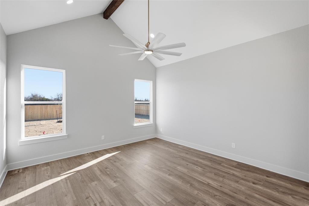 348 Lacek Mill Road China Spring, TX 76633 - Photo 23 of 40 wooden floor in an empty room with a window