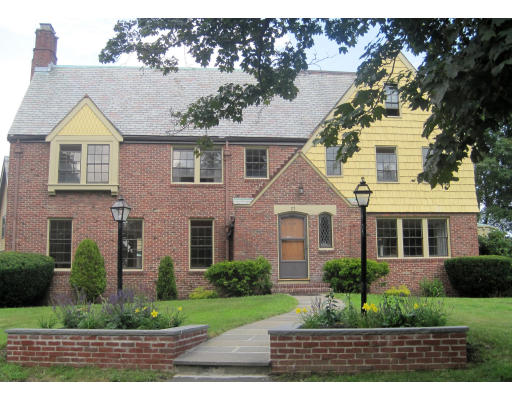 front view of a house with a yard