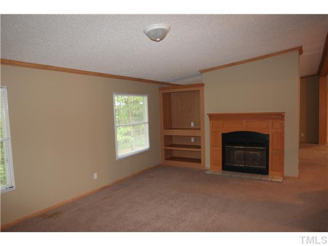 214 Jb Lane Roxboro, NC 27574 - Photo 4 of 16 Dining room with fireplace