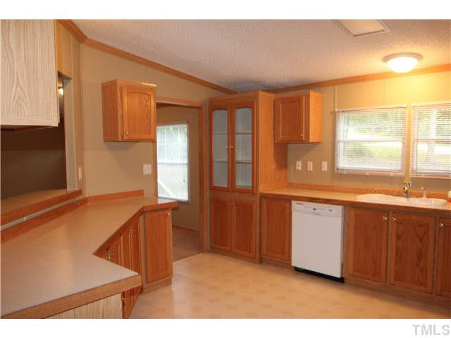 214 Jb Lane Roxboro, NC 27574 - Photo 7 of 16 Kitchen with lots of cabinets