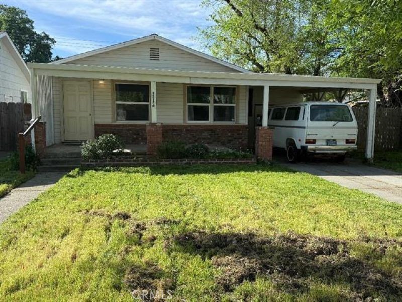 1517 Tehama Street Corning, CA 96021 - Photo 1 of 7 a front view of a house with a yard