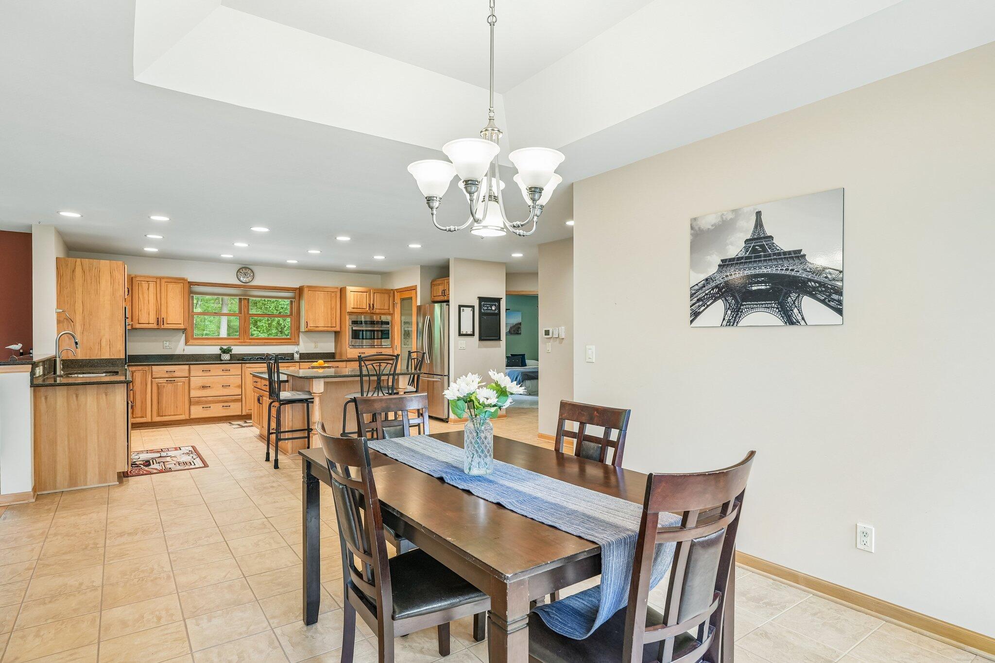 8040 West S County Line Road Franklin, WI 53132 - Photo 11 of 49 Open to the Kitchen and living room
