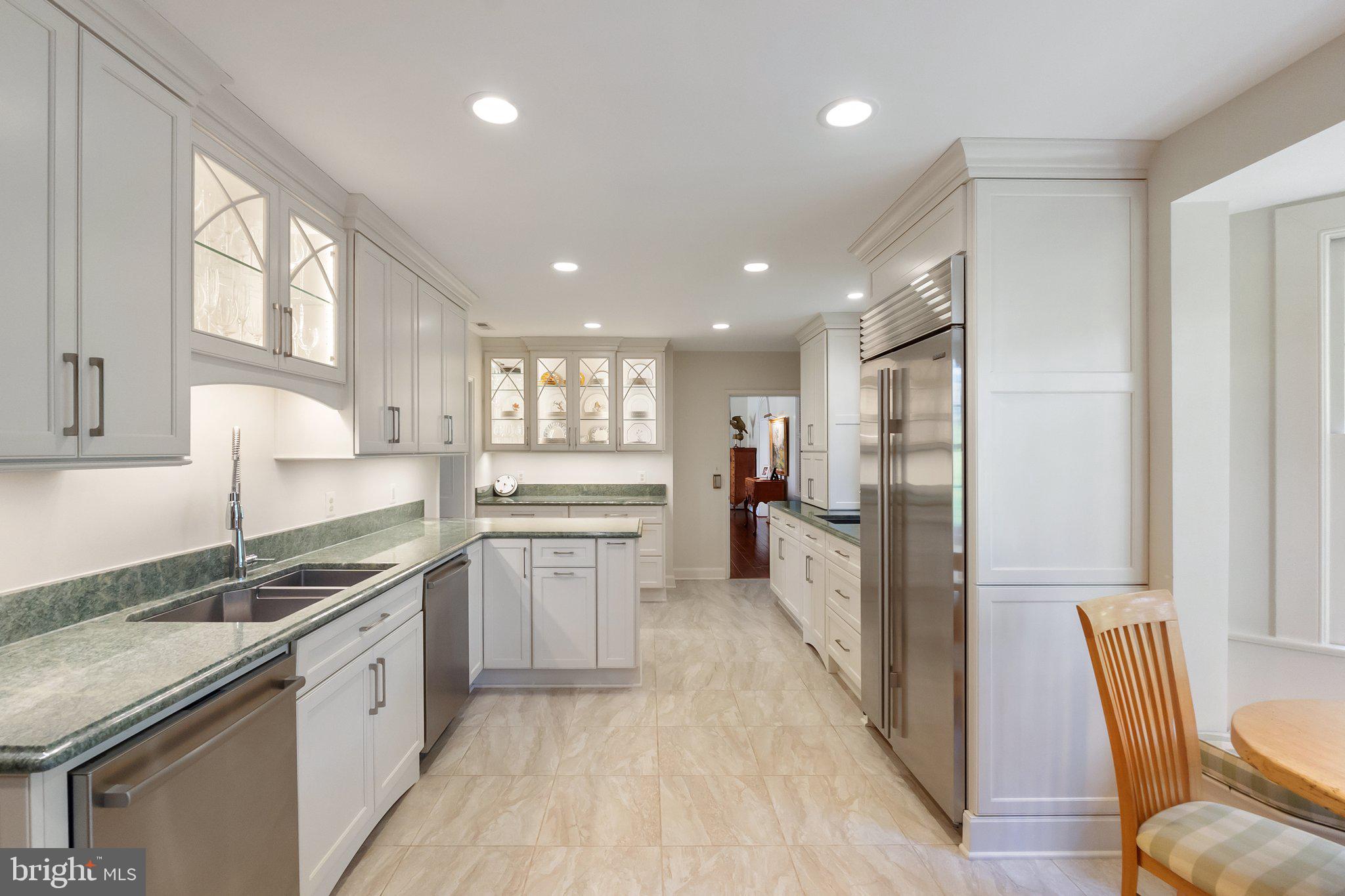 2573 Zulla Road The Plains, VA 20198 - Photo 14 of 81 a large kitchen with stainless steel appliances granite countertop a lot of counter space and wooden floors