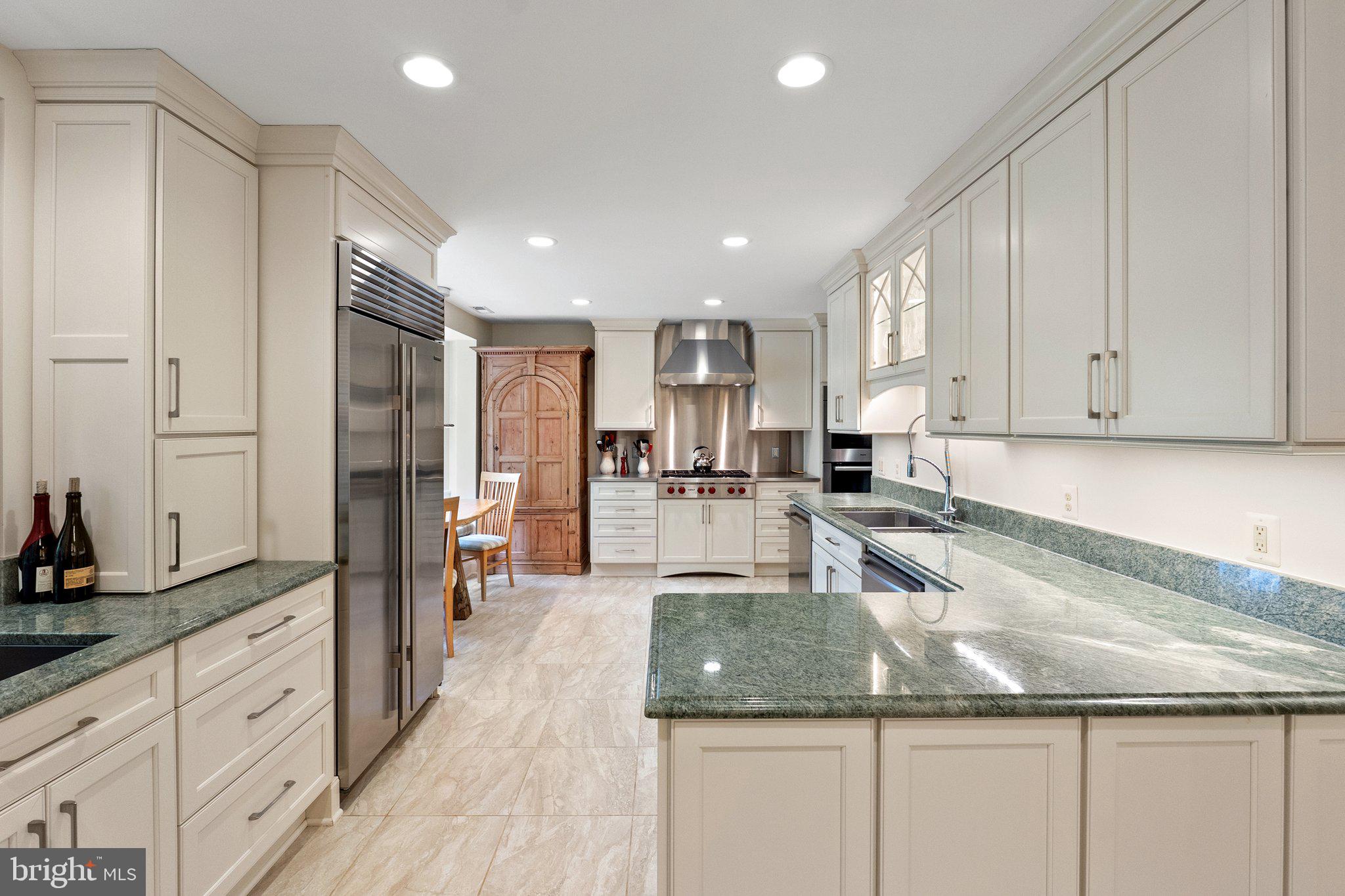 2573 Zulla Road The Plains, VA 20198 - Photo 15 of 81 a kitchen with granite countertop a sink a counter top space stainless steel appliances and cabinets