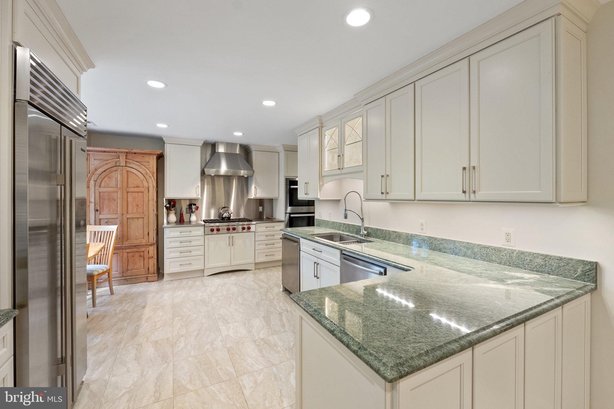 2573 Zulla Road The Plains, VA 20198 - Photo 17 of 81 a kitchen with stainless steel appliances granite countertop a sink stove and refrigerator