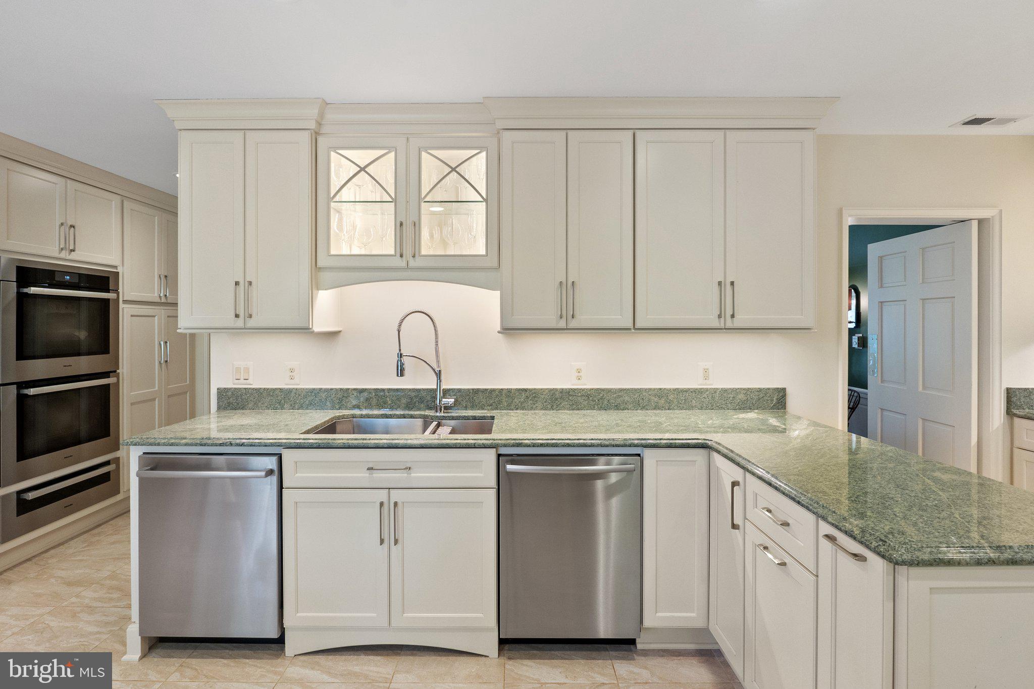 2573 Zulla Road The Plains, VA 20198 - Photo 18 of 81 a kitchen with white cabinets appliances and a sink