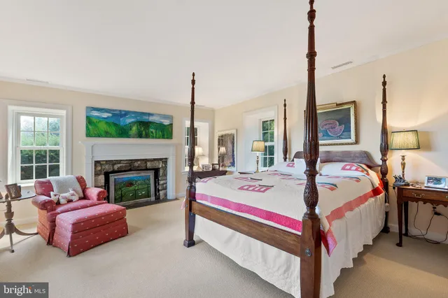 a front view of house with yard and outdoor seating