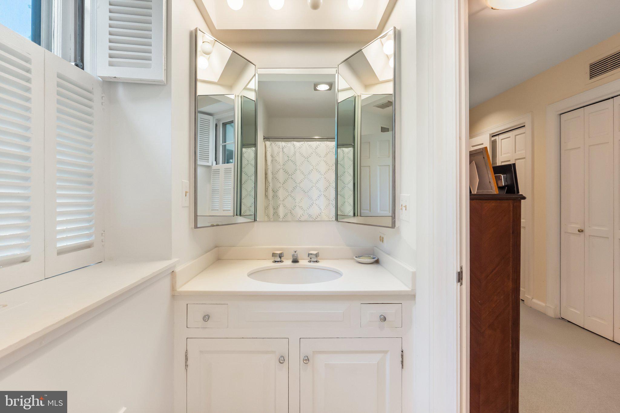 2573 Zulla Road The Plains, VA 20198 - Photo 38 of 81 a bathroom with a sink and a mirror