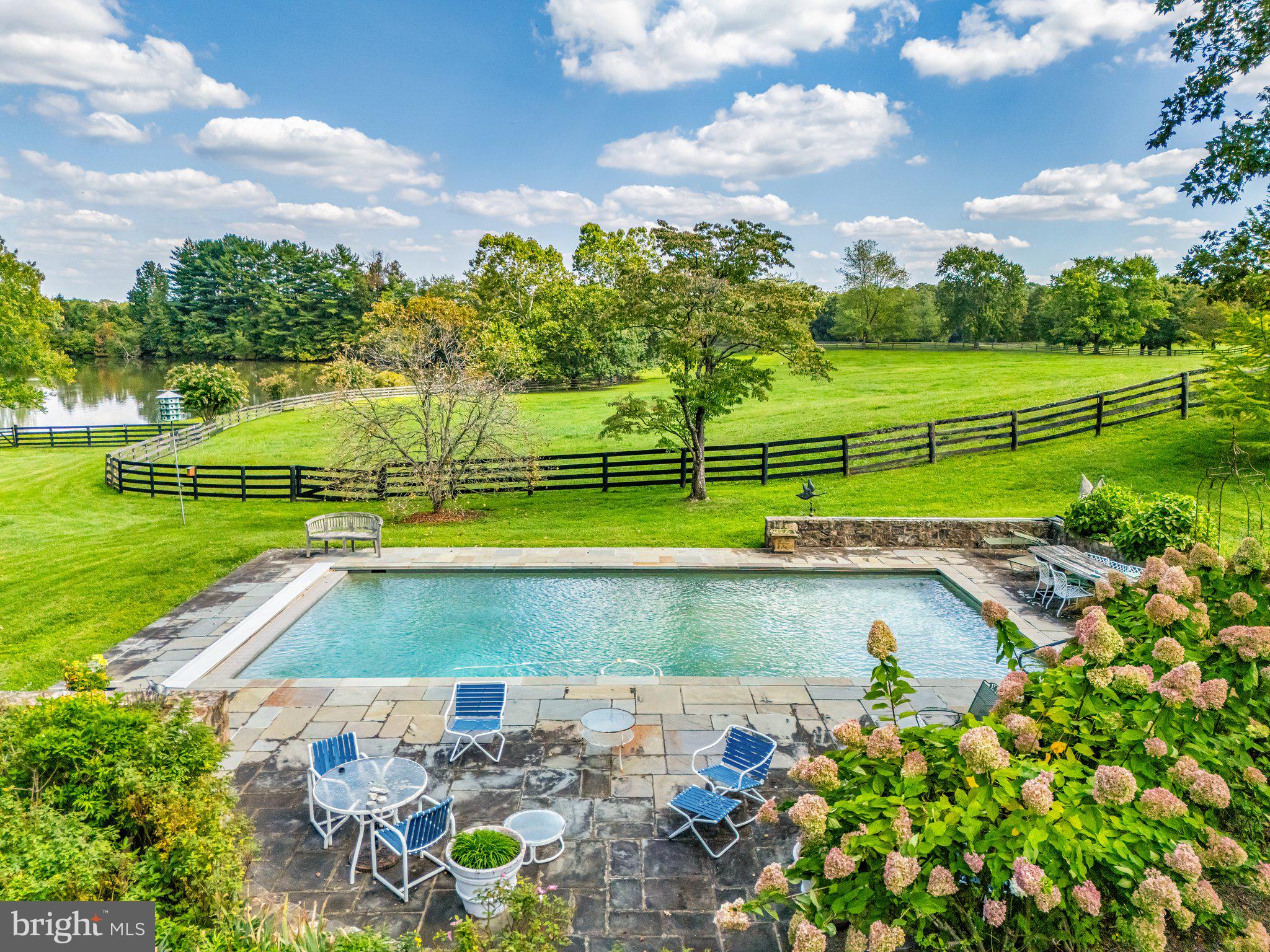 2573 Zulla Road The Plains, VA 20198 - Photo 57 of 81 a view of a swimming pool with a yard and sitting area
