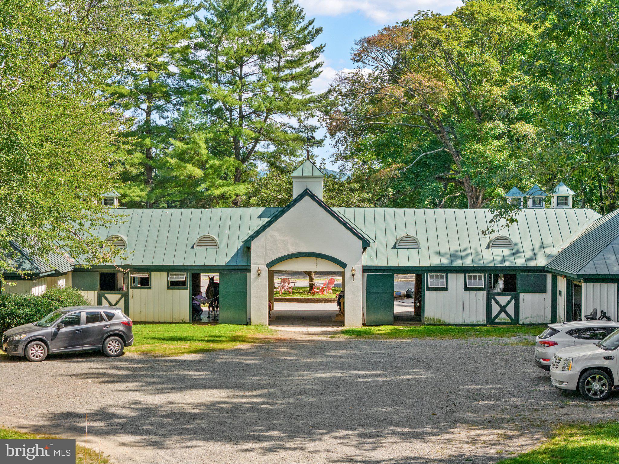 2573 Zulla Road The Plains, VA 20198 - Photo 68 of 81 a front view of a building with a garden and parking space
