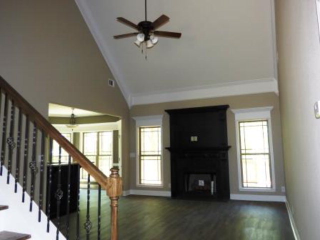 211 Timber Ridge Boulevard Byron, GA 31008 - Photo 14 of 31 a view of an entryway with wooden floor and livingroom