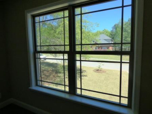 211 Timber Ridge Boulevard Byron, GA 31008 - Photo 25 of 31 a view of a room with large windows
