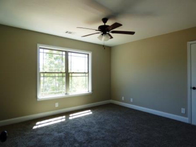 211 Timber Ridge Boulevard Byron, GA 31008 - Photo 26 of 31 a view of an empty room with a window