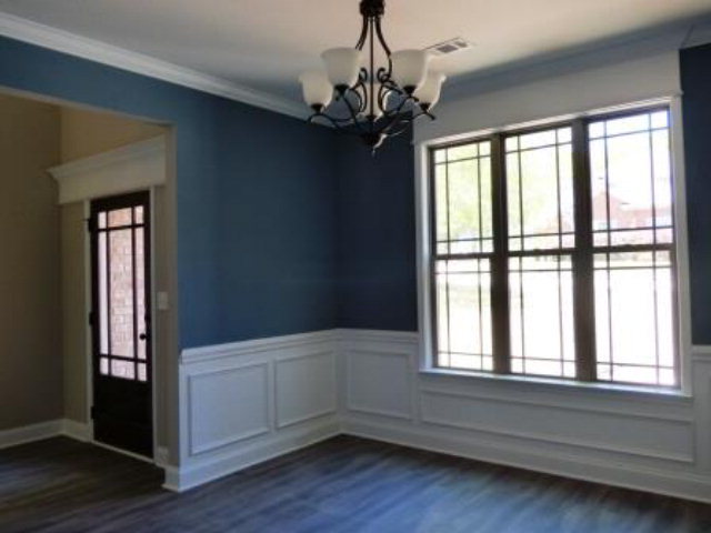 211 Timber Ridge Boulevard Byron, GA 31008 - Photo 5 of 31 a view of an empty room with wooden floor and a window