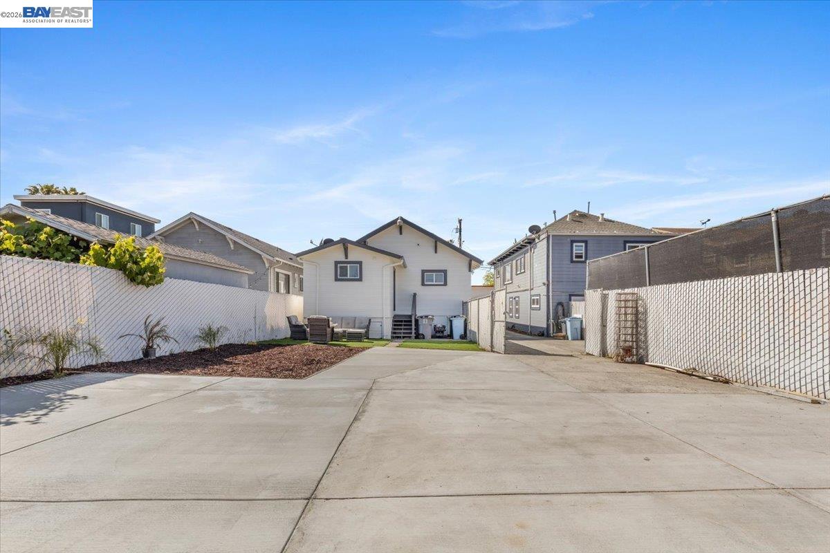 1237 Ashby Avenue Berkeley, CA 94702 - Photo 28 of 31 a view of a house with a yard