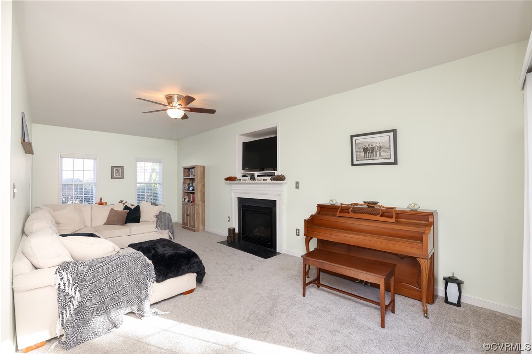 1600 Winterfield Place Midlothian, VA 23113 - Photo 11 of 43 a bedroom with furniture and a fireplace