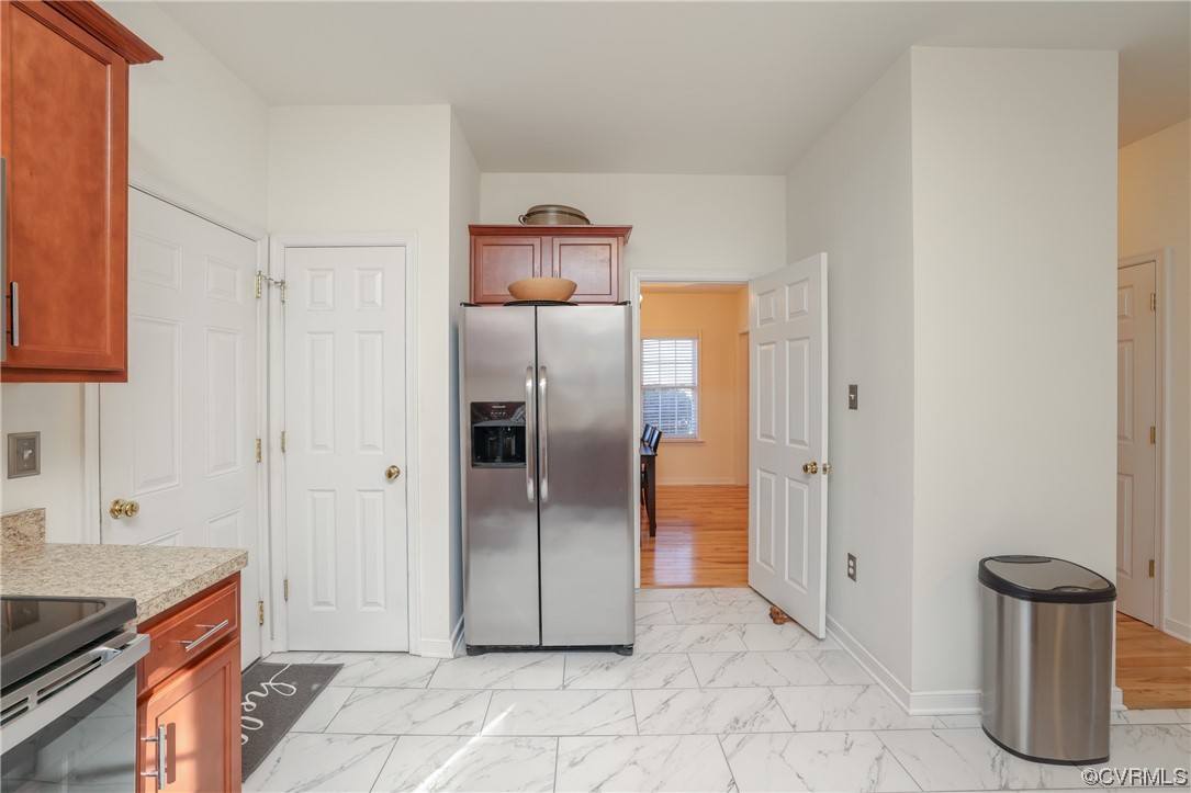 1600 Winterfield Place Midlothian, VA 23113 - Photo 17 of 43 a view of a kitchen with refrigerator and cabinets