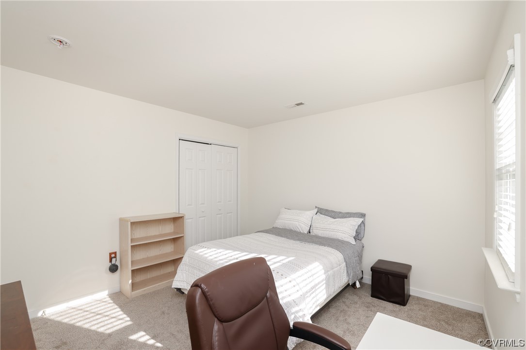 1600 Winterfield Place Midlothian, VA 23113 - Photo 23 of 43 a bedroom with a bed and a window