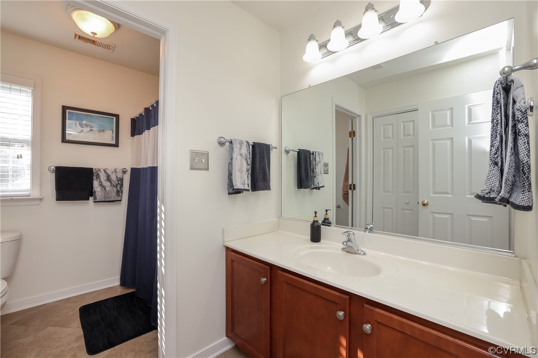 1600 Winterfield Place Midlothian, VA 23113 - Photo 24 of 43 a bathroom with a sink a double vanity and a mirror
