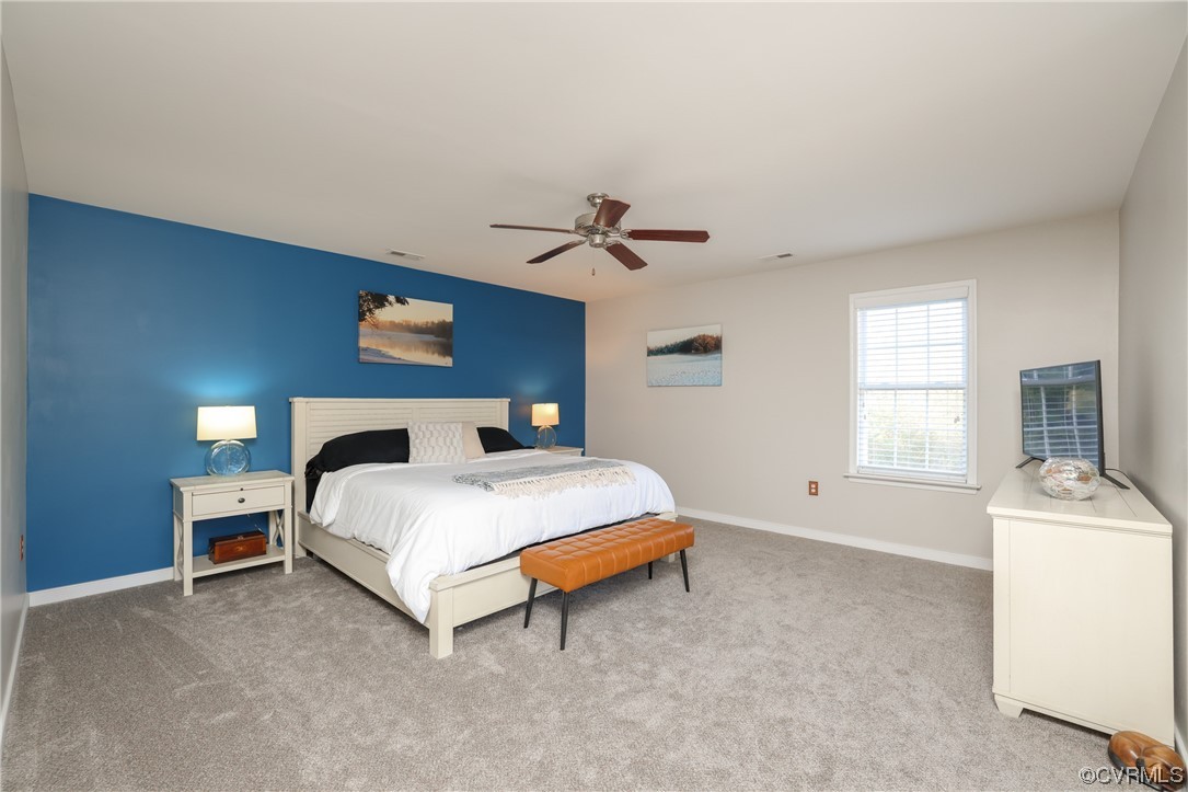 1600 Winterfield Place Midlothian, VA 23113 - Photo 29 of 43 a spacious bedroom with a bed and a table