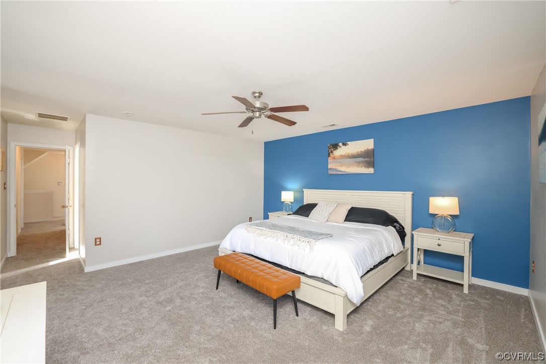 1600 Winterfield Place Midlothian, VA 23113 - Photo 30 of 43 a spacious bedroom with a bed and a table