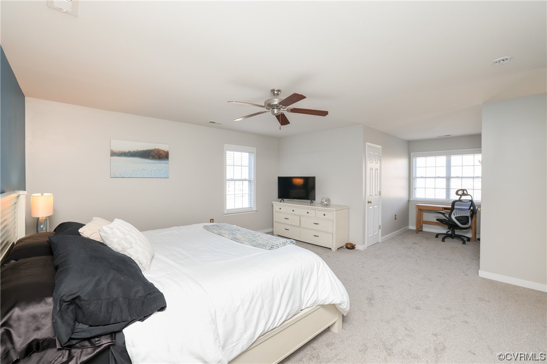 1600 Winterfield Place Midlothian, VA 23113 - Photo 31 of 43 a spacious bedroom with a bed and a tv