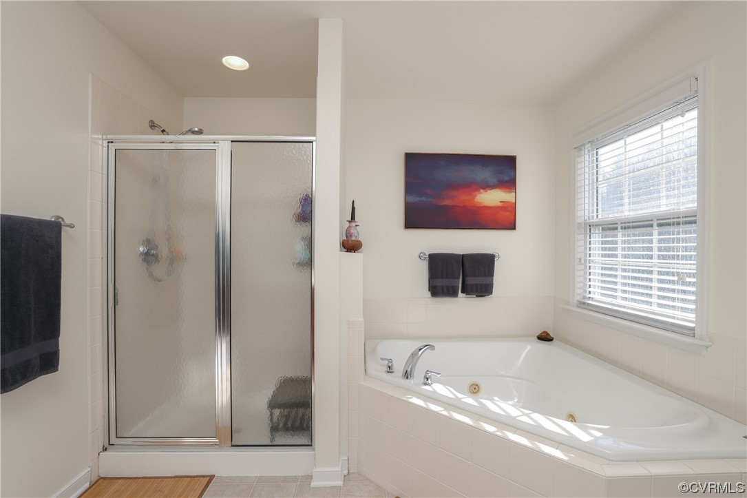 1600 Winterfield Place Midlothian, VA 23113 - Photo 35 of 43 a bathroom with a tub a sink and a shower
