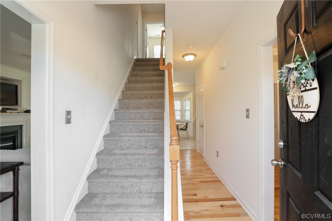 1600 Winterfield Place Midlothian, VA 23113 - Photo 4 of 43 a view of a hallway with wooden floor and entryway